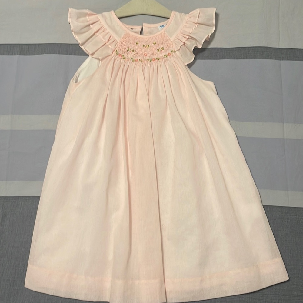 Beautiful smocked pink dress.